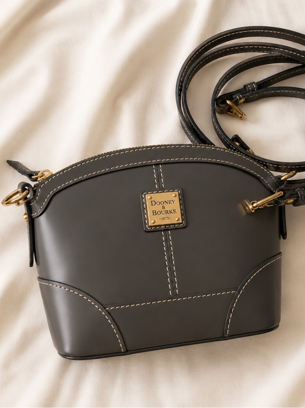 Dooney & Bourke Dark Gray Dome Mini Crossbody with Gold Plaque